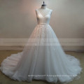 Superbe col en V sans manches Long train Shinning Beads Robes de mariée en dentelle avec train long